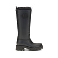 Moncler black PVC rain boots, mid-calf pull-on with embossed logo and treaded sole