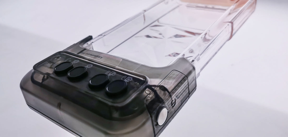Clear waterproof phone case showing dark back window and circular camera area