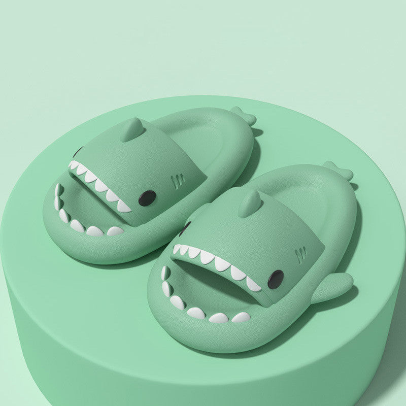 Mint green shark-shaped slide sandals with open toe and dorsal fin