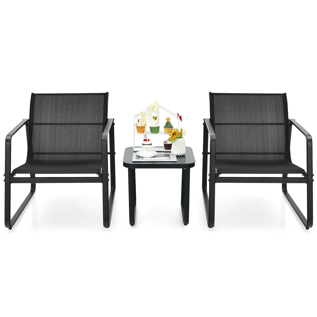 Studio view of black patio bistro set: two mesh chairs and square glass table
