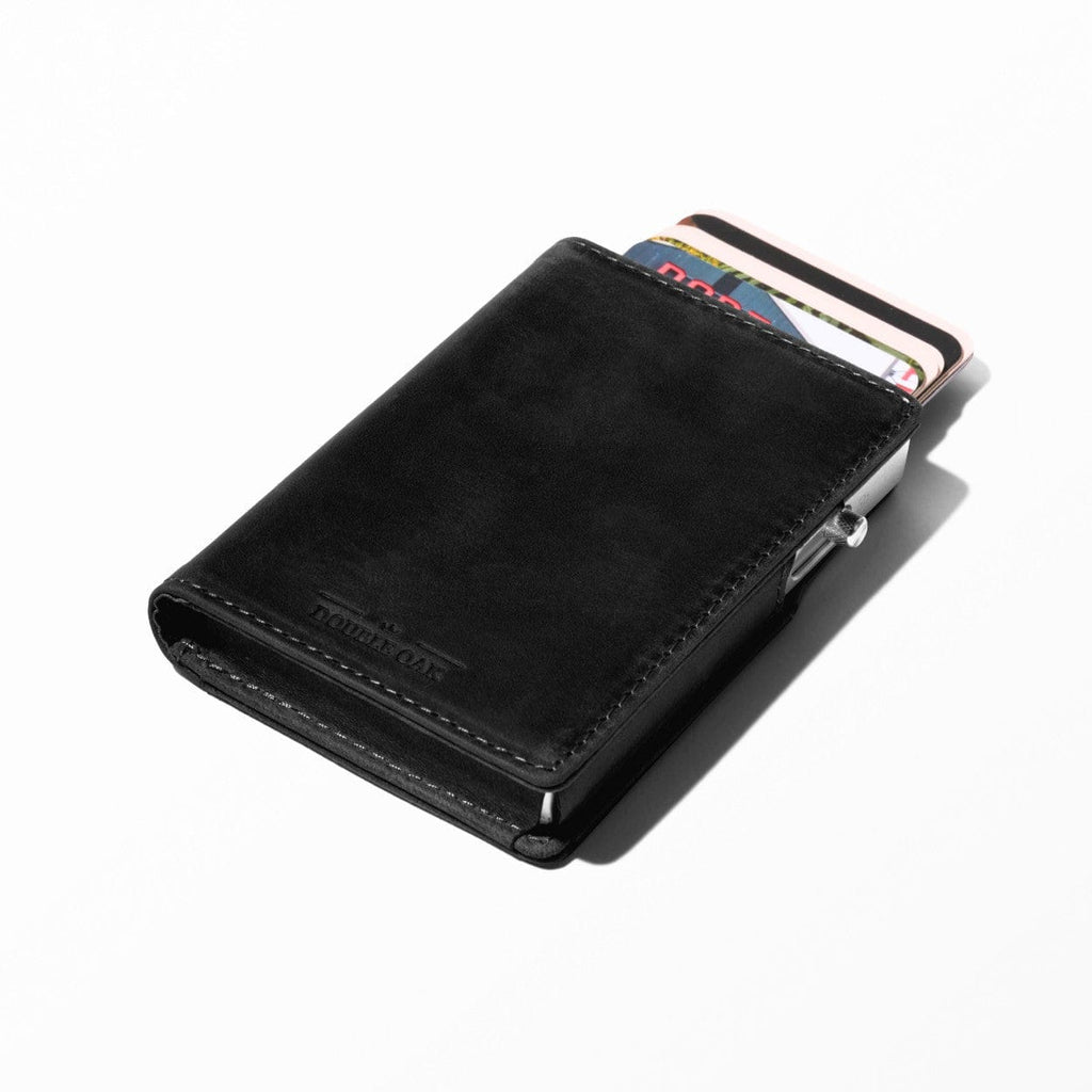Black bifold leather wallet with card slots protruding and snap closure