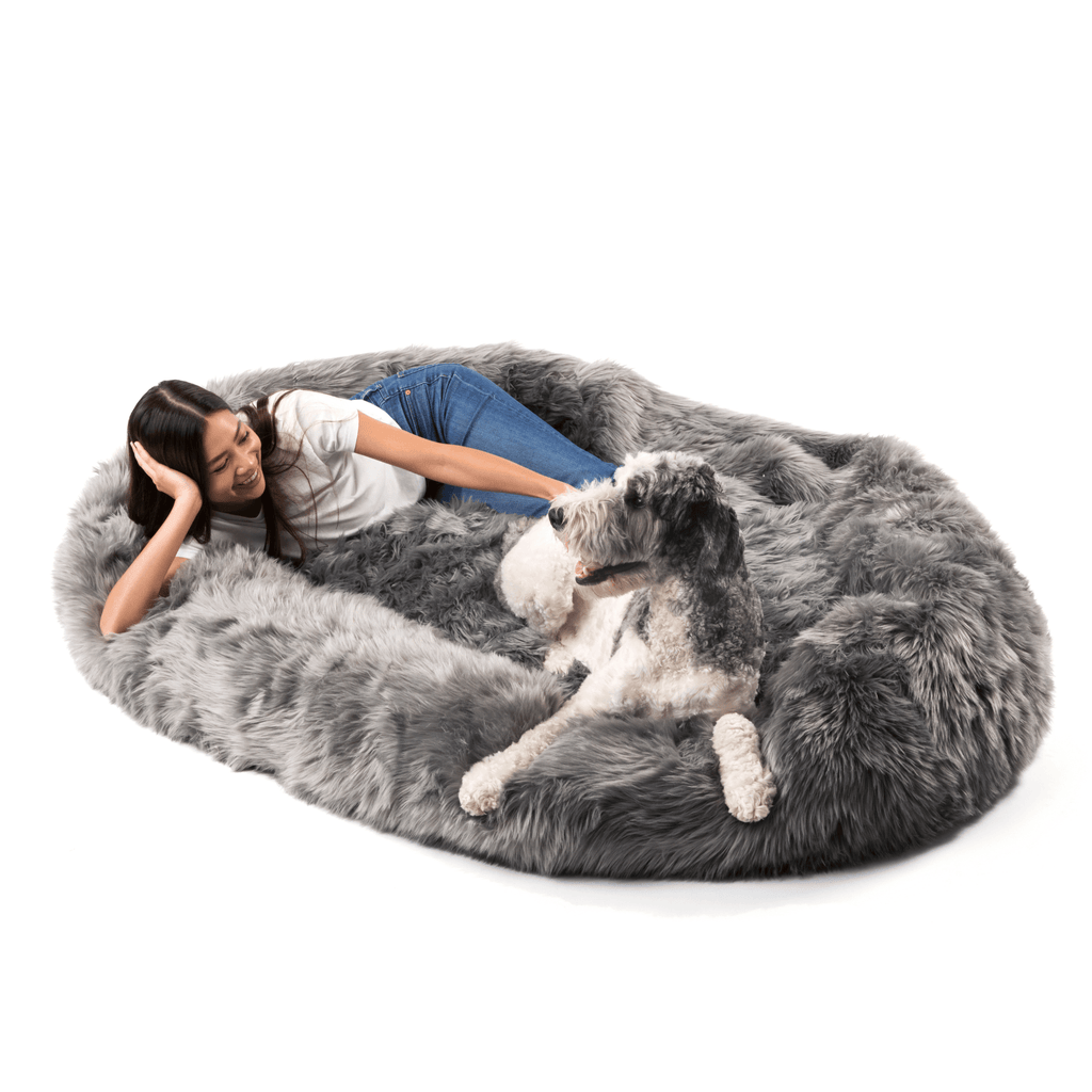 PupCloud™ charcoal grey faux fur memory foam dog bed, oval with thick raised edge
