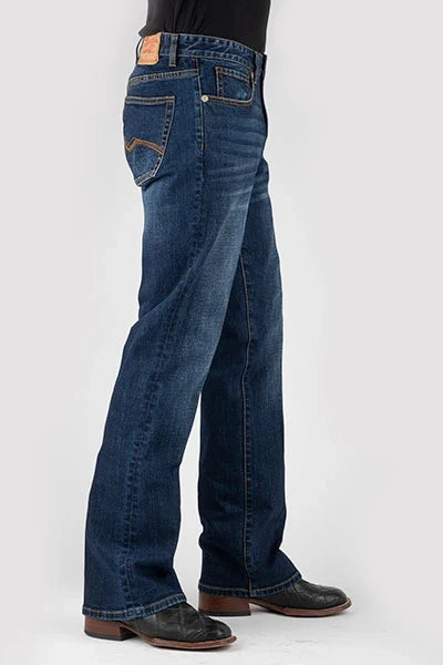 Men's dark wash denim jeans, side view with contrast stitching and leather patch