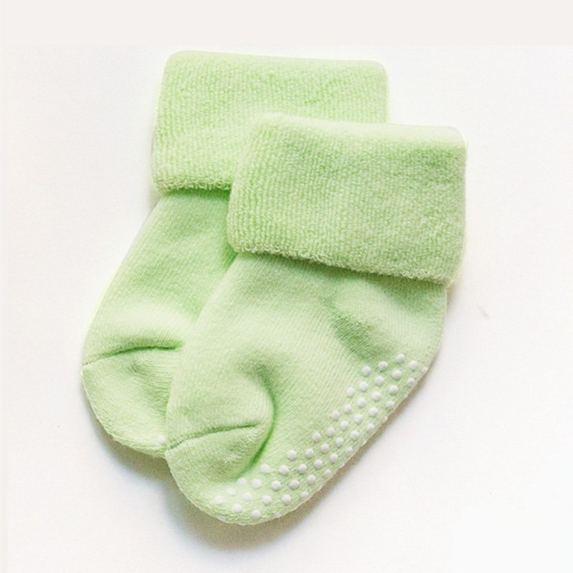 Green children non-slip socks with dotted grip on the sole, folded cuff