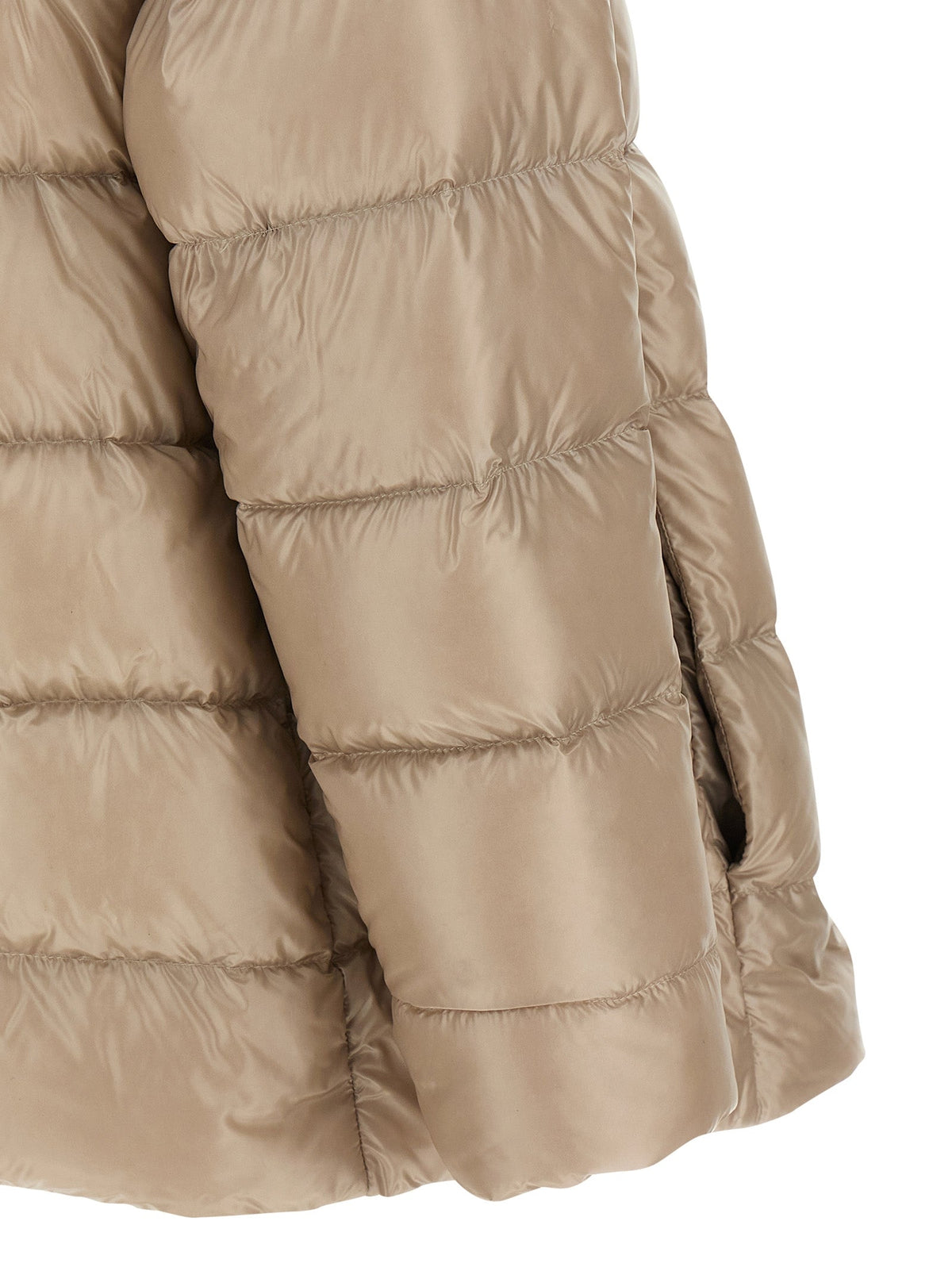 Beige quilted puffer jacket with sleeve detail and front zipper at side