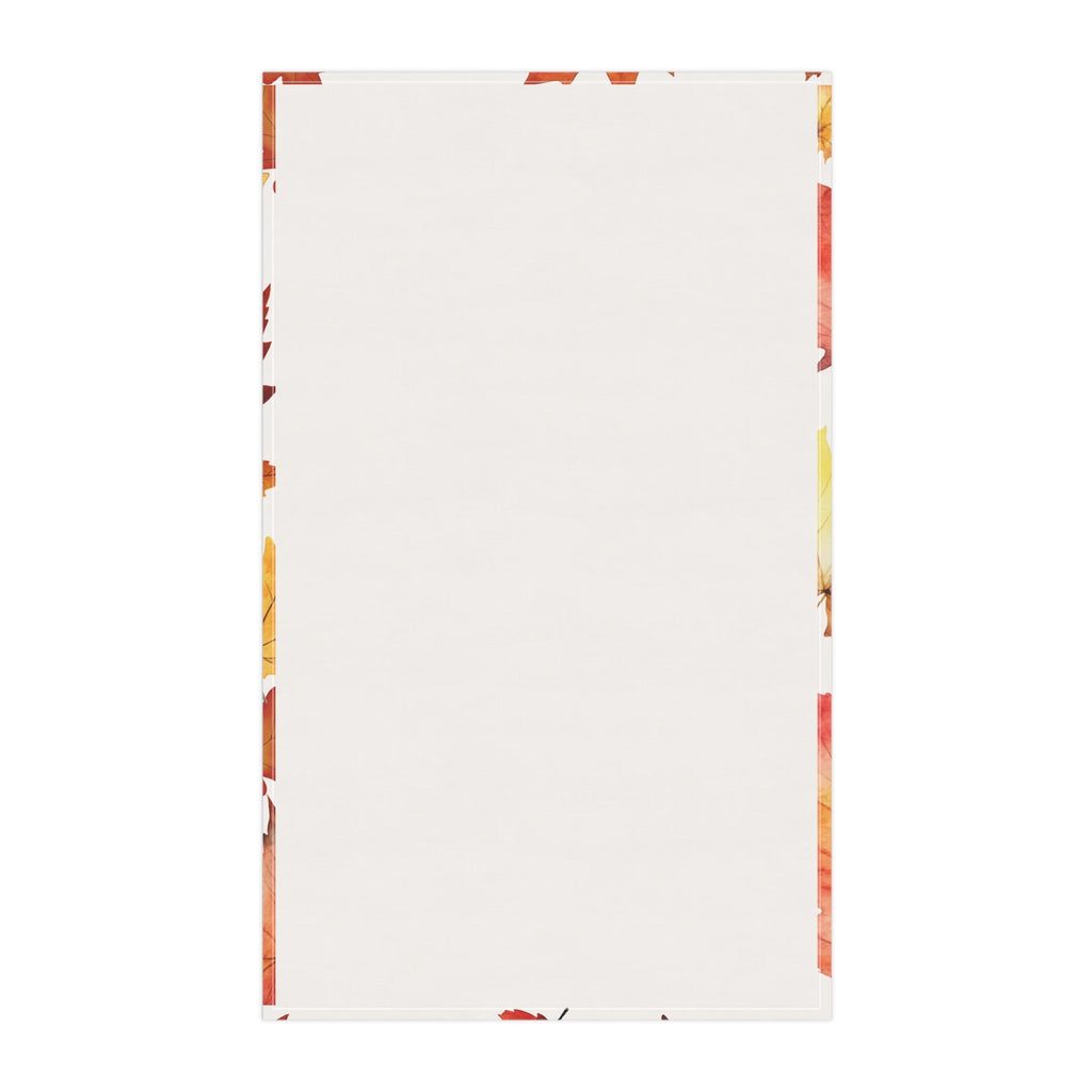 Plain white tea towel back with small fall leaf print edging on the sides