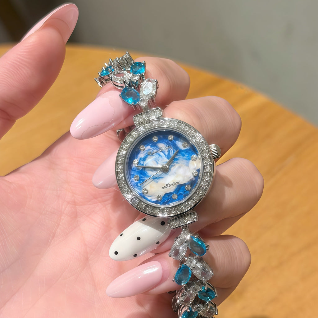 Blue floral dial wristwatch with turquoise stones and rhinestone link bracelet