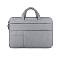 Light gray laptop bag with padded top handle, zipper, and front pocket.