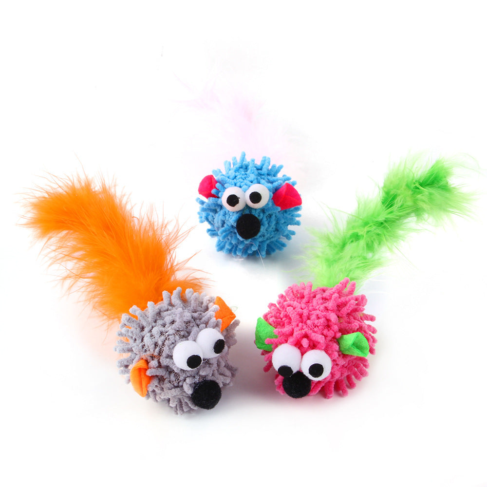Four plush cat toy mice with fuzzy tails in orange, blue, green, and pink