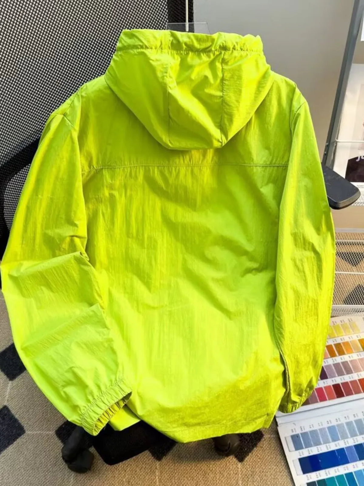 Men's plus size lightweight hooded windbreaker jacket, neon green, back view
