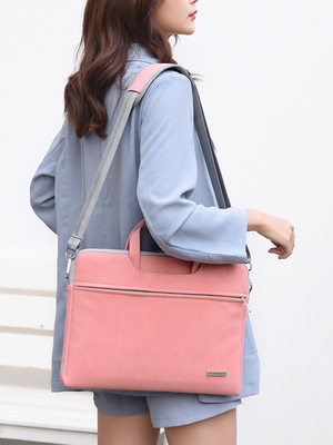 Pink PU leather laptop bag with adjustable shoulder strap and front zip pocket
