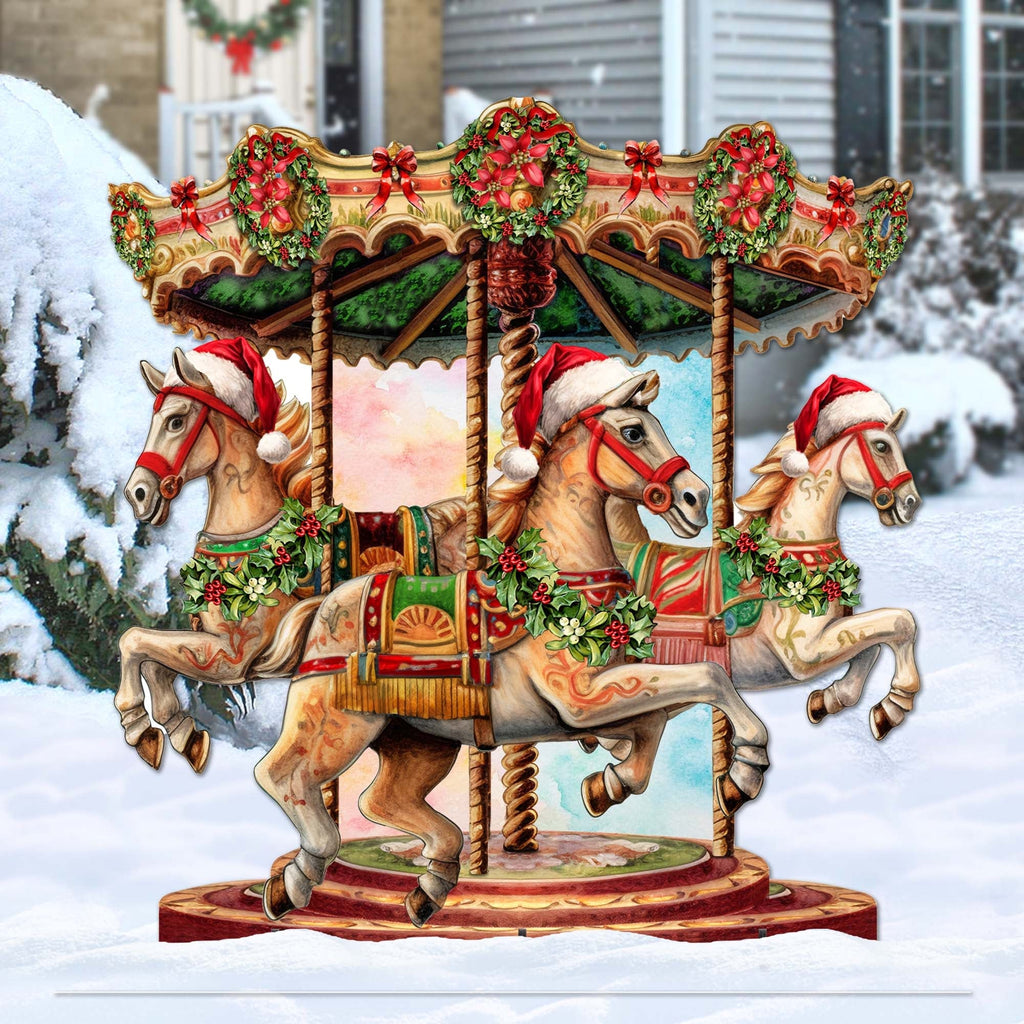 Christmas carousel outdoor decor with three painted carousel horses and festive holiday garland