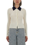 Cream merino wool cardigan with navy point collar and button front, long sleeves
