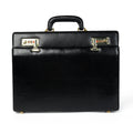 Black leather briefcase with top handle and gold-tone clasp hardware