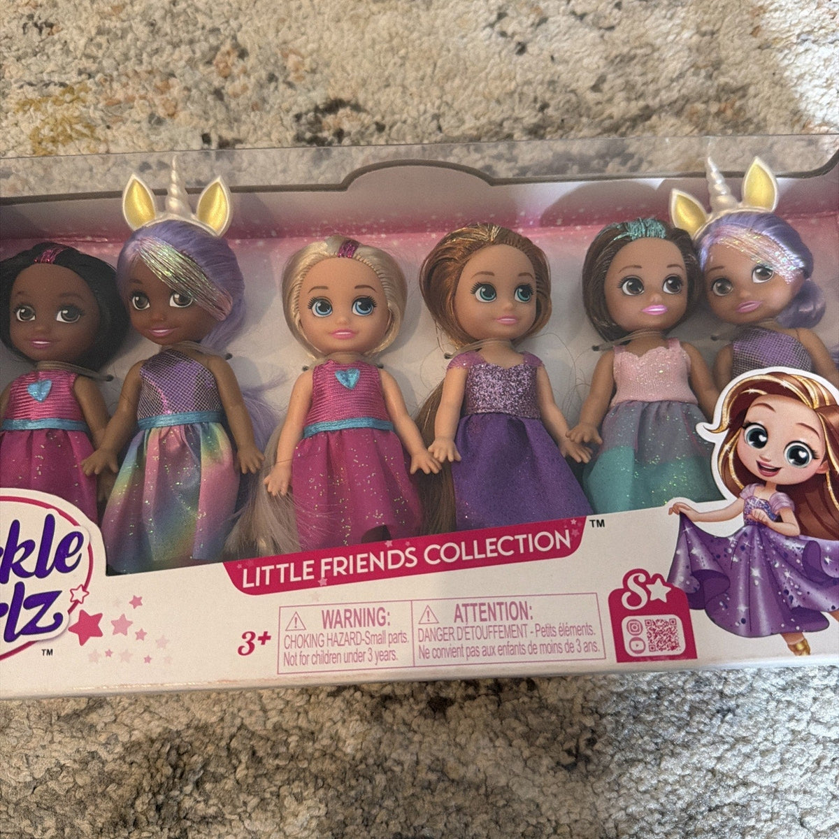 Set of 6 girl dolls with long hair and sparkle outfits, retail box front
