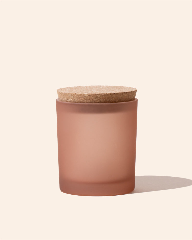 Frosted apricot 7oz candle vessel with cork lid on top