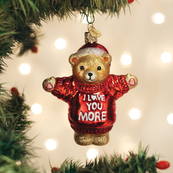 Hanging bear ornament with red glitter sweater and “I LOVE YOU MORE” front text