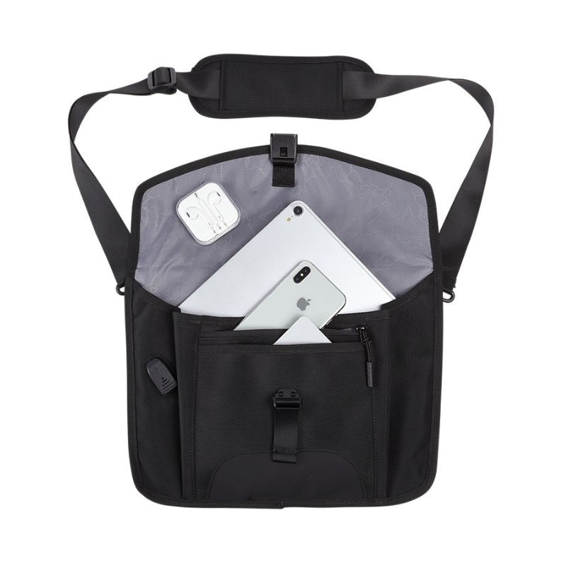 Black waterproof messenger bag open with inner compartments and device pocket