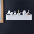 Wall-mounted bathroom shelf, white rectangular shelf holding assorted bathroom bottles