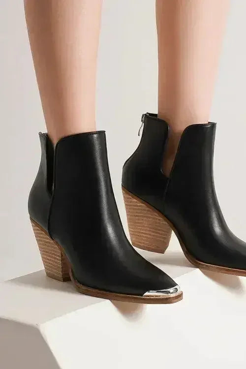 Black faux-leather ankle boots with pointed metal toe and block heel, pair front view