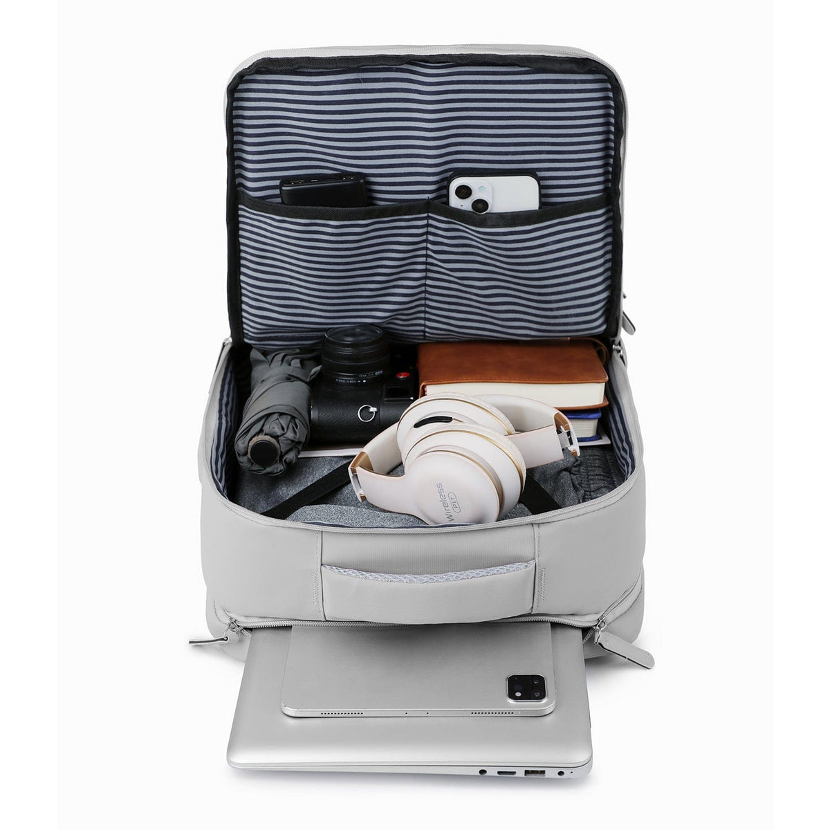 Storm gray open backpack showing striped interior pouches and laptop compartment