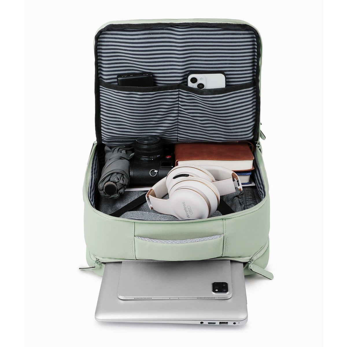 Mint green open backpack showing striped interior storage pockets.