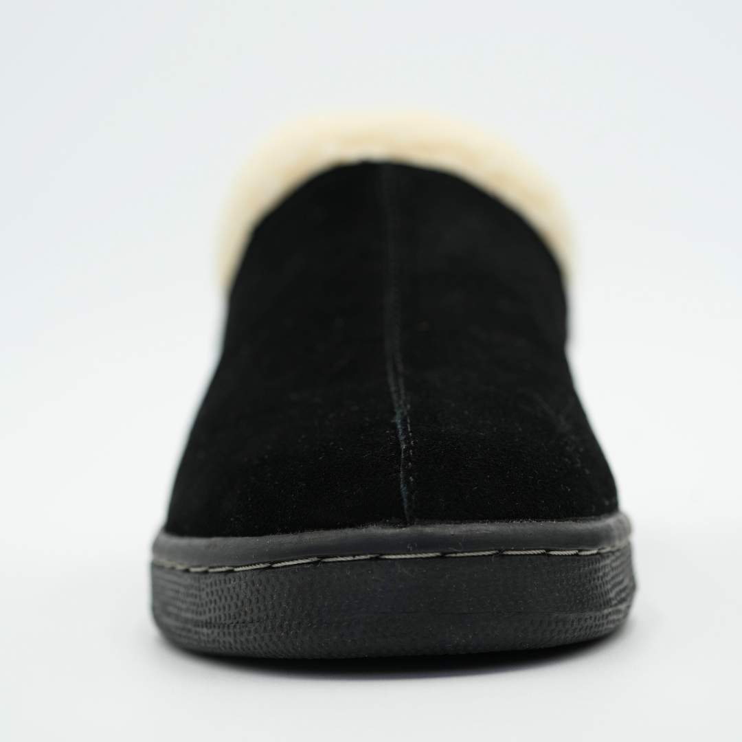 Women's black slipper heel with cream fleece lining and grippy outsole