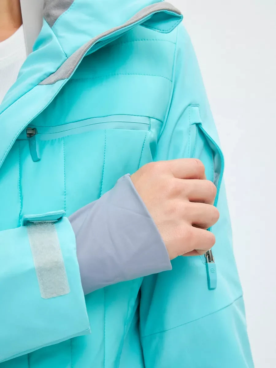 Mint hooded ski jumpsuit with front storm flap, taped seams, and zip pocket opening