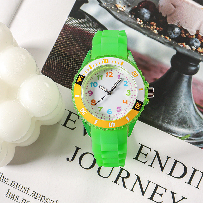 Green kids analog wristwatch with silicone strap and multi-color number bezel