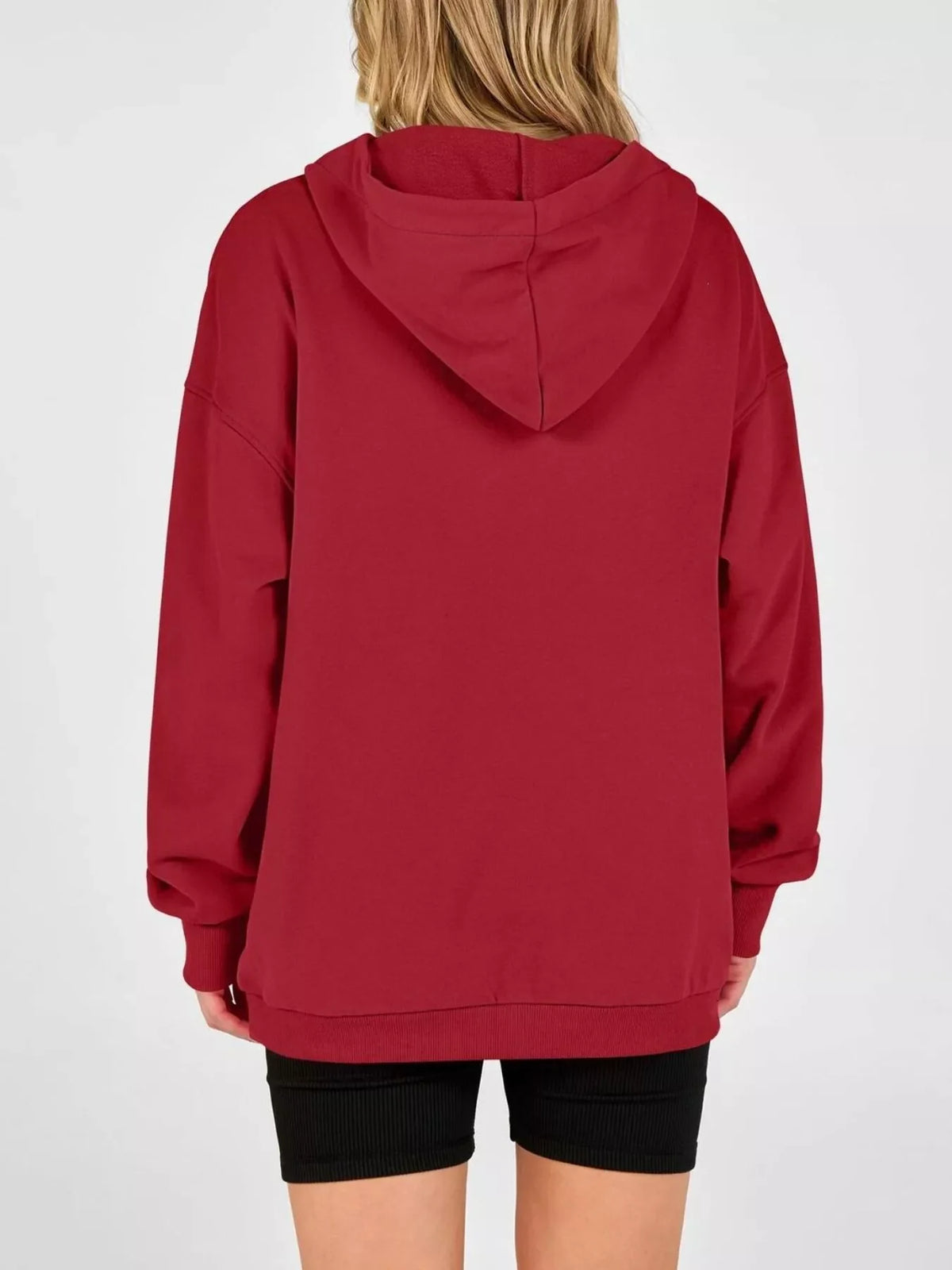 Red hoodie back view with hood and dropped shoulders