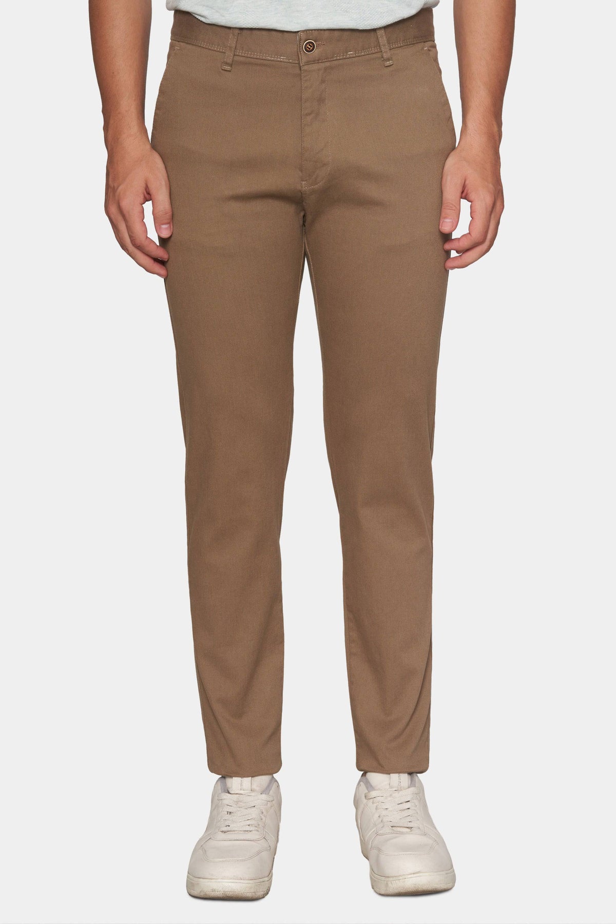 Tan chino pants with button fly, belt loops, and front slash pockets