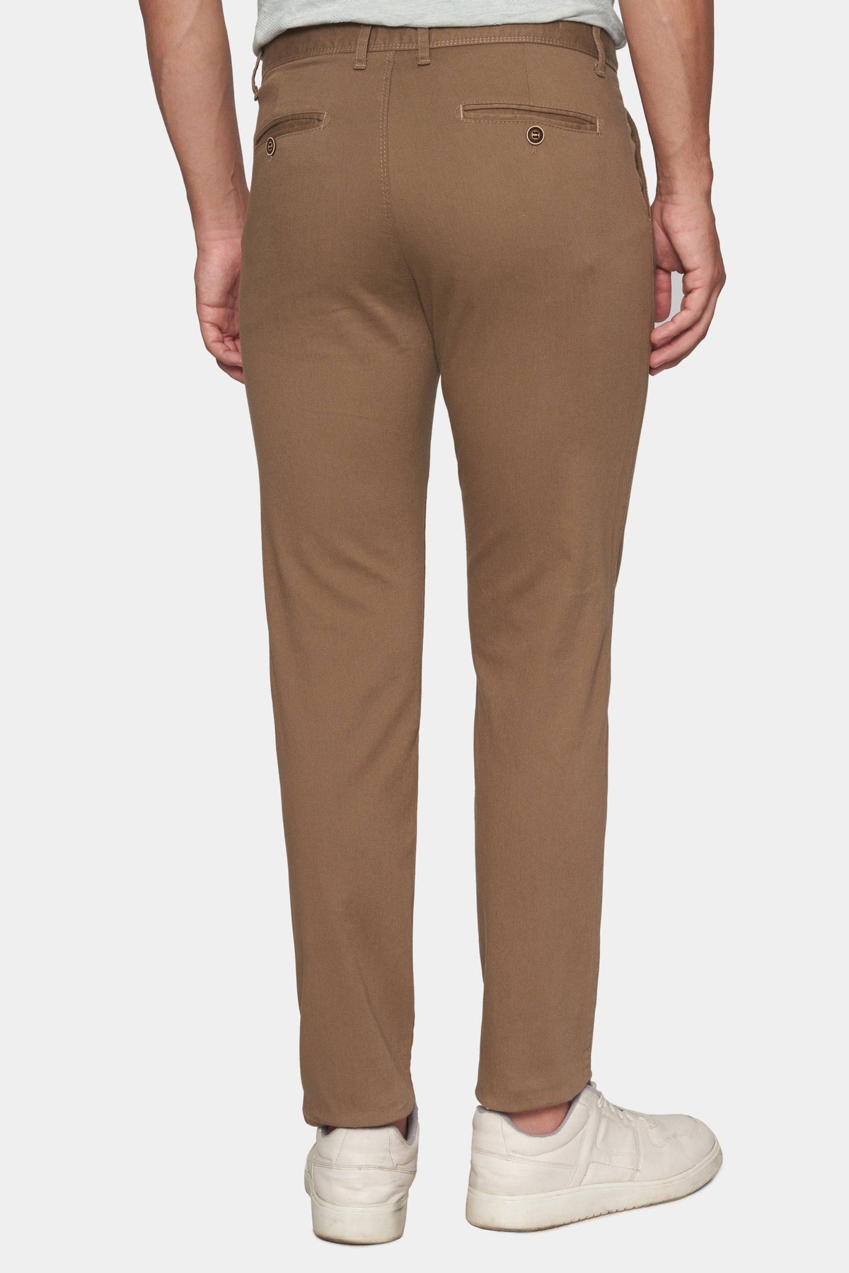 Tan chino pants with tapered leg and back welt pockets