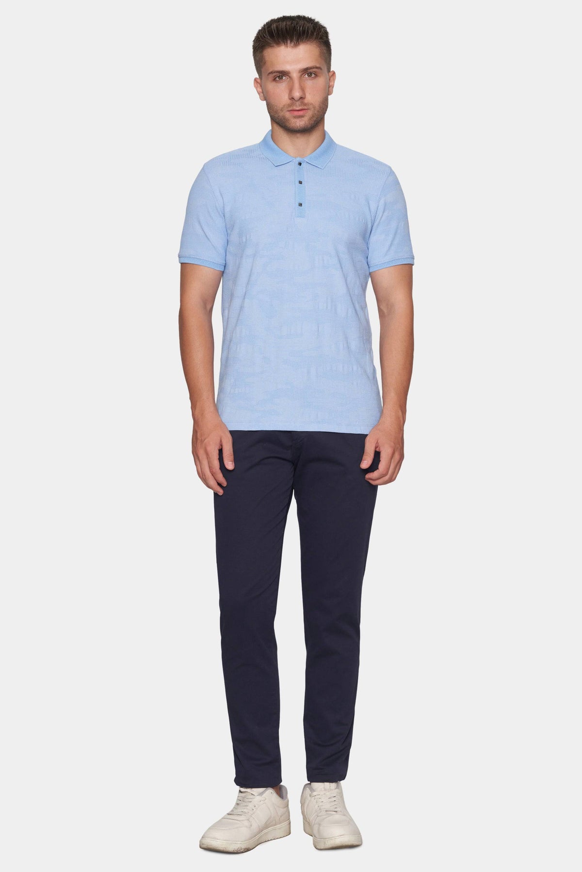 Dark navy chinos, straight-leg fit with belt loops and button fly