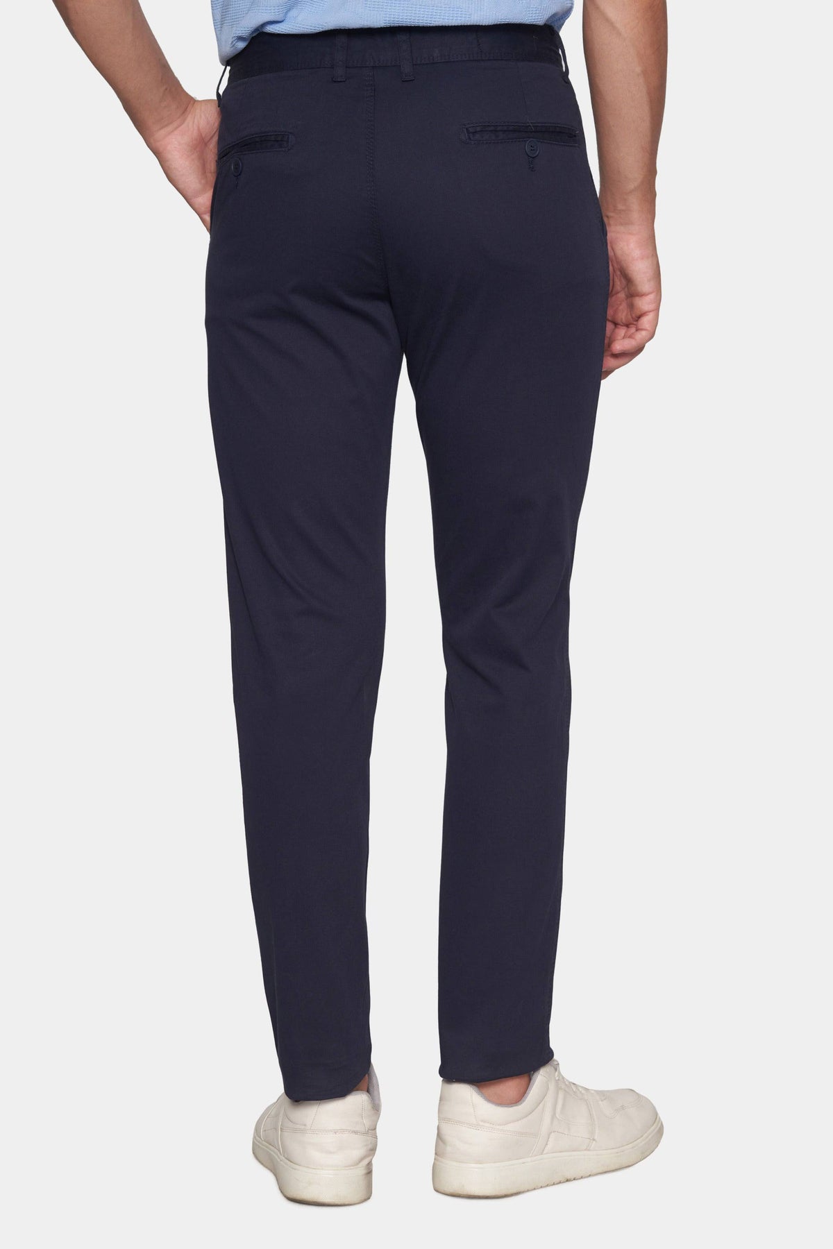 Dark navy chino pants with tapered straight legs and front pockets