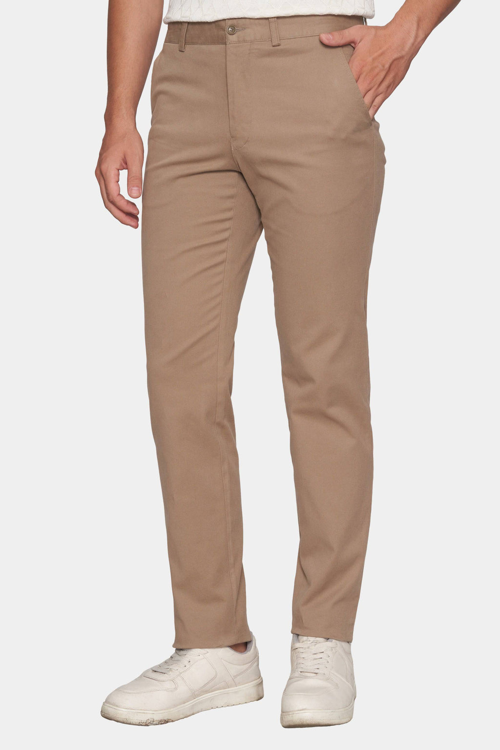 Tan chino pants with zip fly, belt loops, and front slant pockets