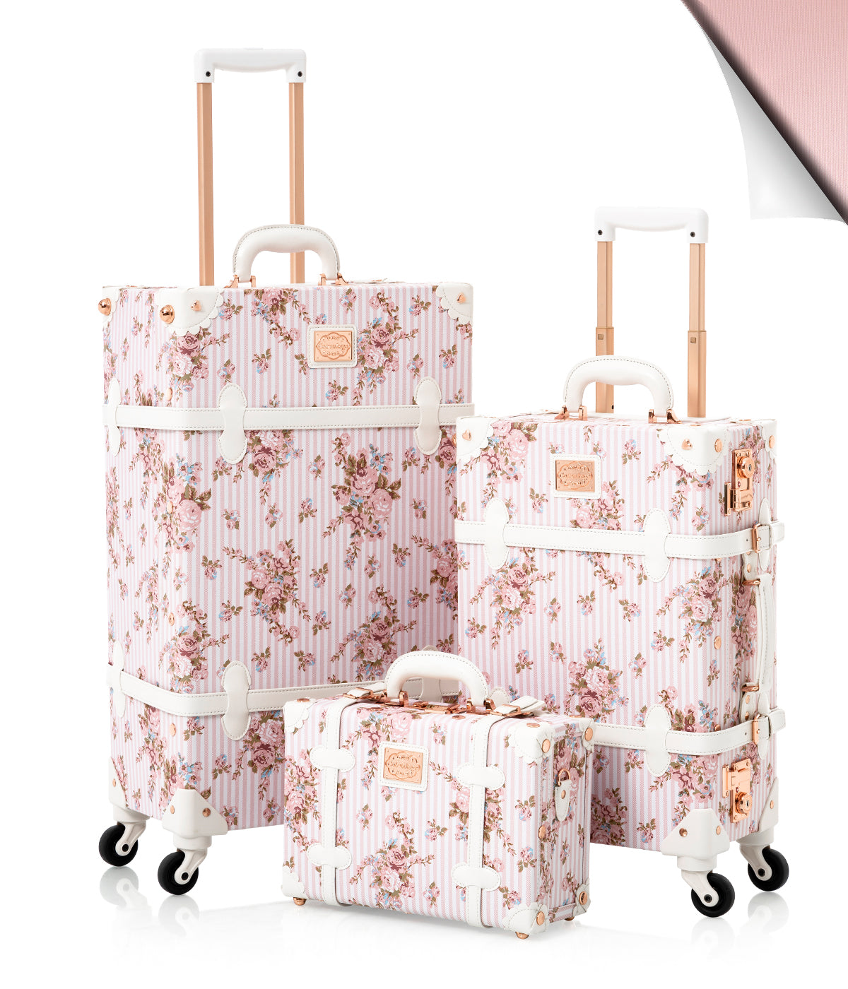 Pink floral 3-piece luggage set with telescoping handles and spinner wheels