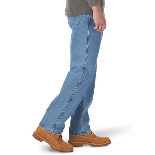 Men's straight-leg jeans in light indigo wash, side view with stitched seam