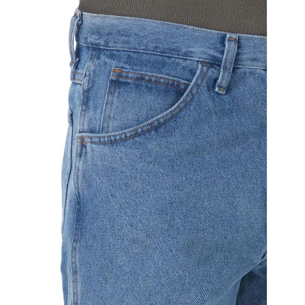 Men's indigo jeans close-up of back pocket and orange contrast stitching