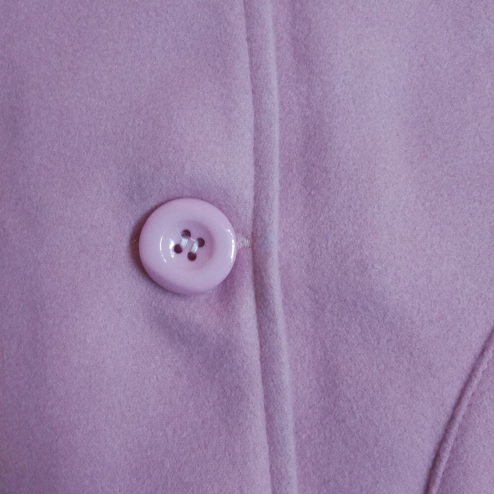 Pink coat front button detail on a long-sleeve hooded jacket