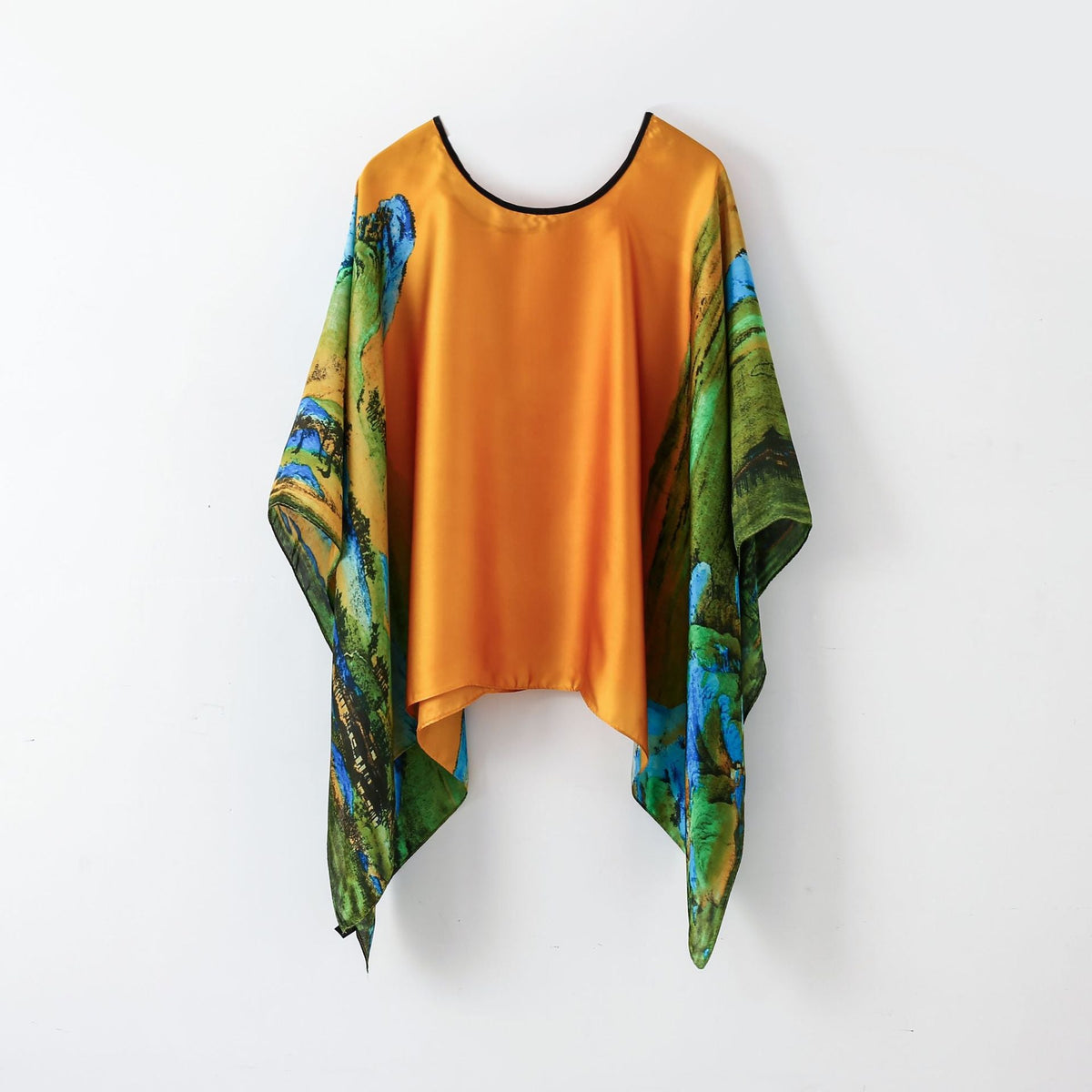Orange pullover shawl cover-up with multicolor floral print sleeves and layered hem
