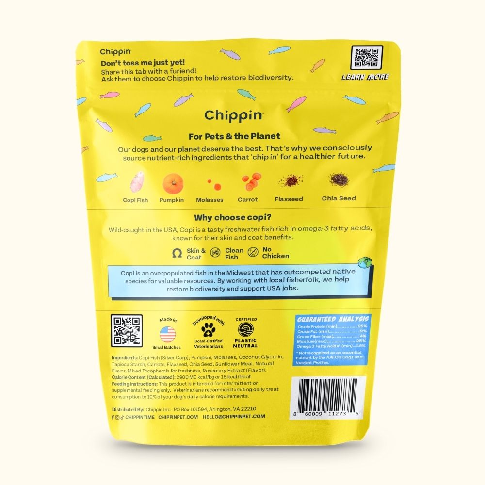 Back panel of yellow dog treat pouch with ingredients, QR, and barcode