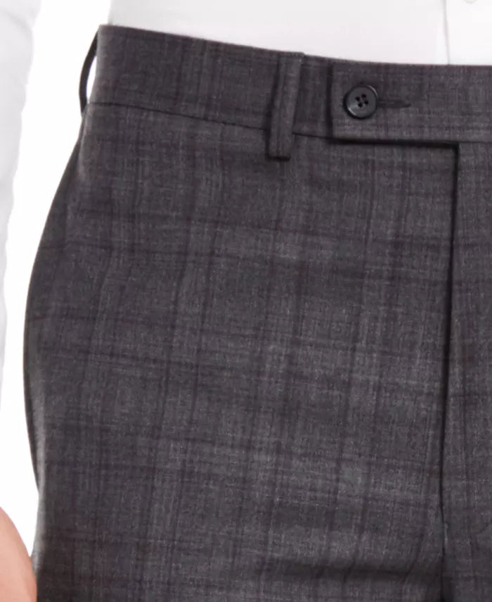 Dark gray plaid suit pants waistband detail with button and pocket