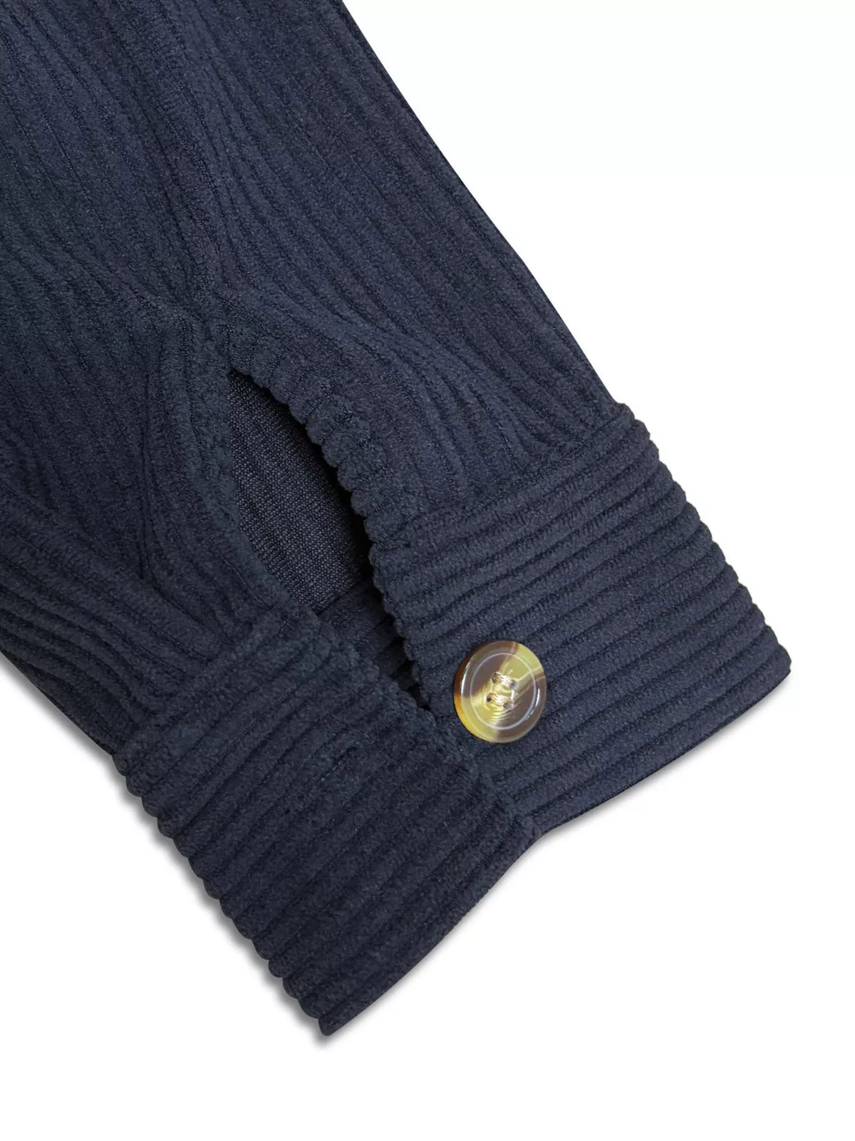Navy corduroy jacket cuff with gold button detail and ribbed texture