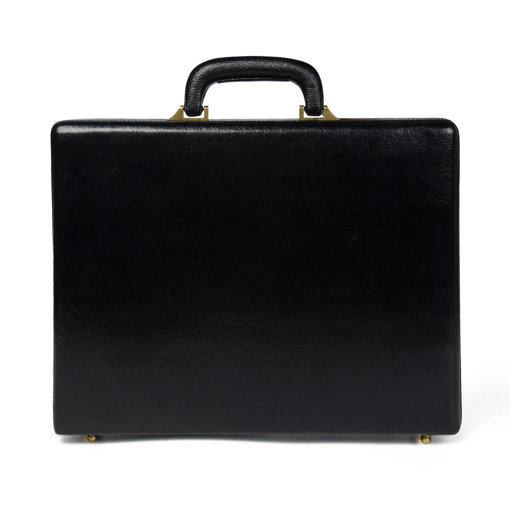 Black leather briefcase with top handle and gold-tone corner feet