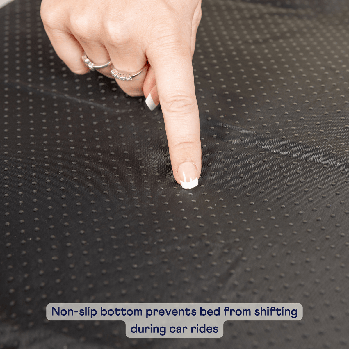 Gray non-slip bottom dog car bed with textured grip base