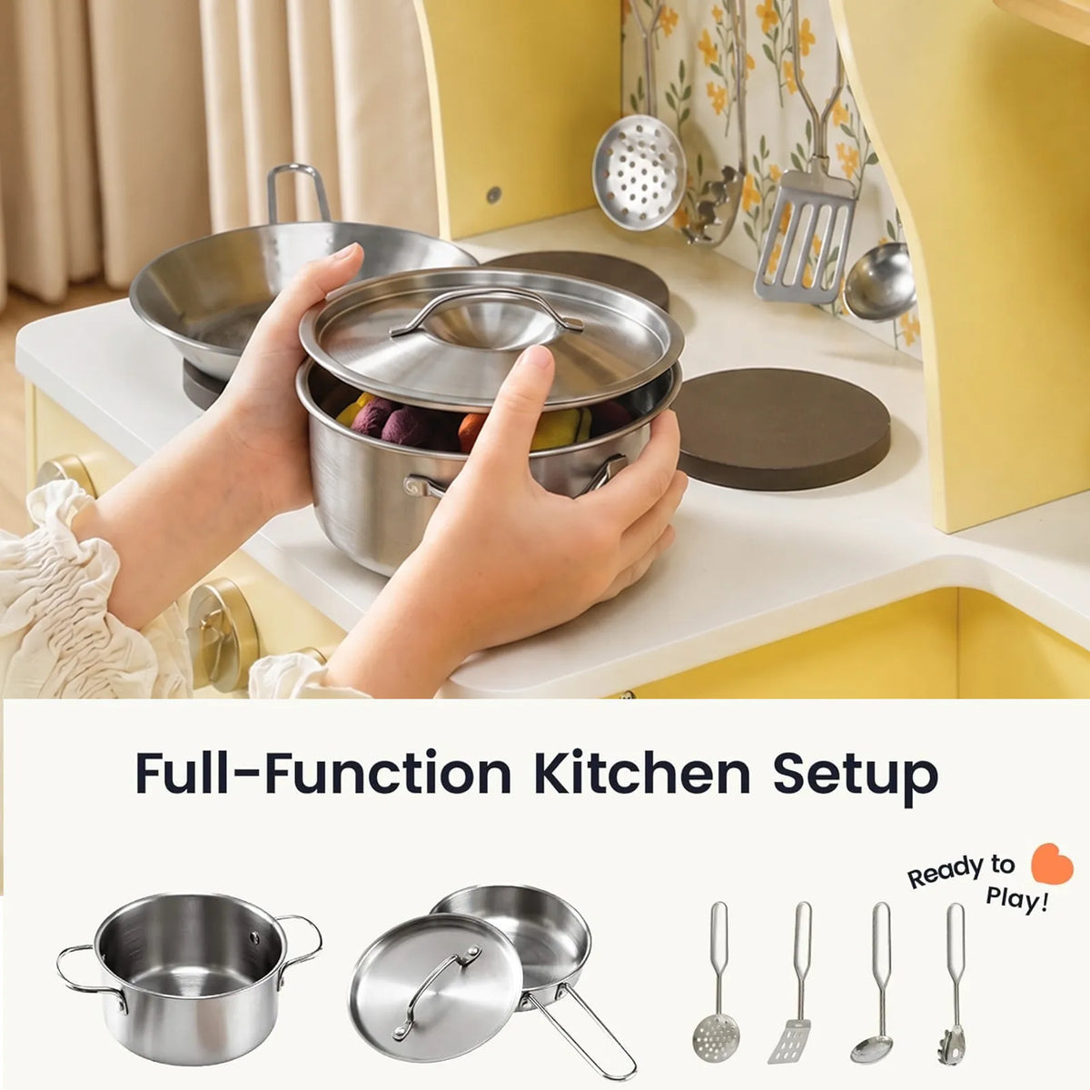 Child holding a metal pot on a yellow wooden play kitchen stove with utensil set