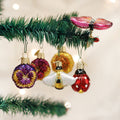 Mini garden ornament set: colorful hanging baubles and flower shapes on a branch