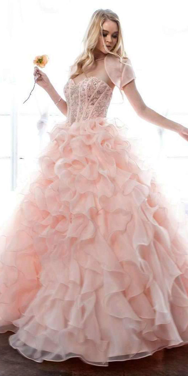 Pink ball gown with beaded corset bodice and layered organza ruffle skirt