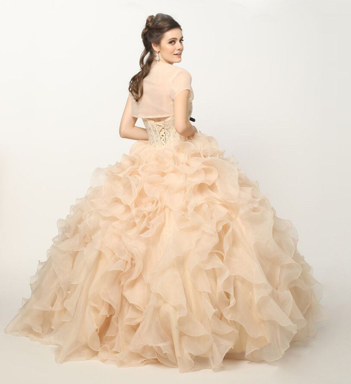 Champagne ball gown with strapless beaded corset and voluminous organza ruffle skirt, side view
