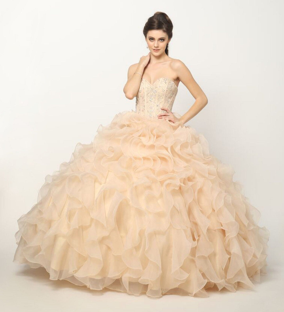 Champagne ball gown with beaded corset bodice and layered organza ruffle skirt